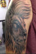 Black and grey Lion portrait tattoo